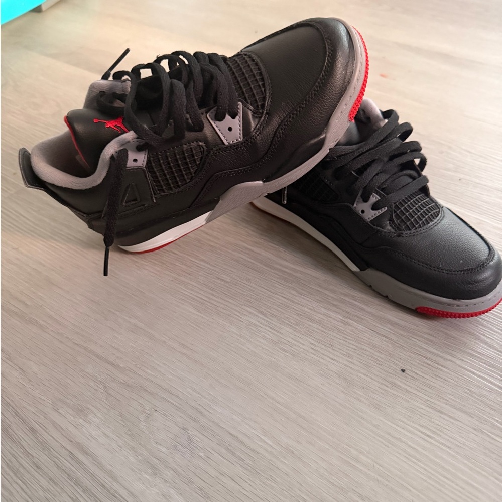 Jordan 4 Bred “ Reimagined “ Black and Red Kids Sneakers